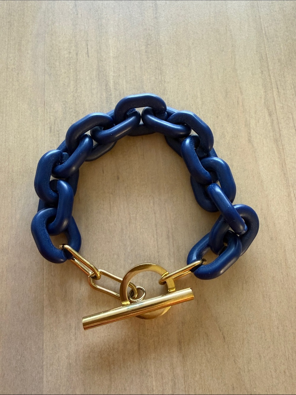 Navy chain link bracelet with gold hardware from Sardinia | old money